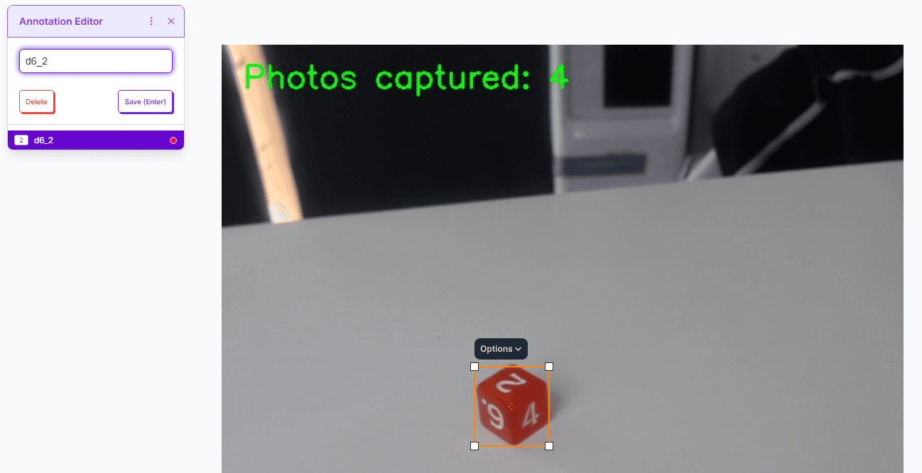 Roboflow annotation interface showing bounding box drawn around real die
